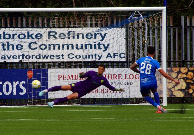 Ben Ahmun scores from the spot for Haverfordwest County against Caernarfon Town. Picture Gordon Thomas